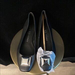 NWOT (never worn) Katy Perry Collections Black ballet flats with Silver Accent